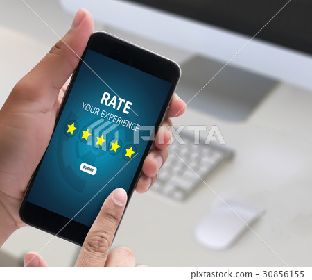 Businessman holding five star rating  Review or 30856155
