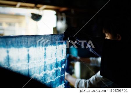 Male seeing finished tie dye Male seeing finished tie dye 30856791