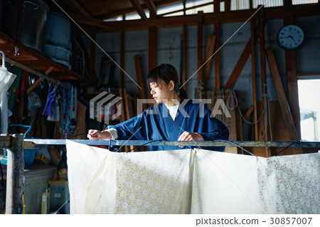 Woman preparing for indigo dye printing dyeing 30857007