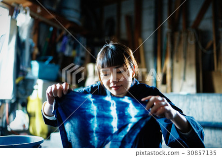 A woman with tie dye 30857135