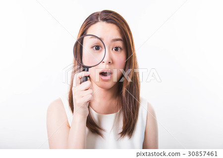 Young lady and magnifying glass 30857461