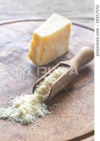 Parmesan cheese on the wooden board Parmesan cheese on the wooden board 30857542