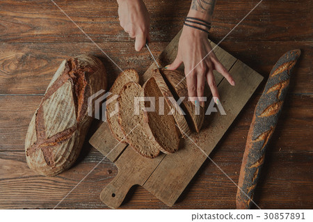Sliced bread on a board 30857891