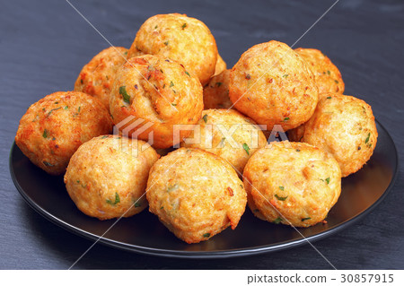 delicious turkey meatballs on black plate 30857915