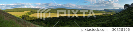 Evening panorama of the green valley. View from Evening panorama of the green valley. View from 30858106