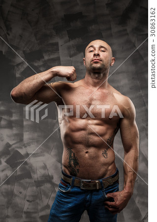 Shirtless muscled fitness man. Cool looking.  30863162
