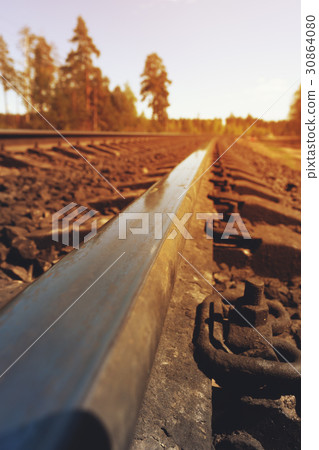 Closeup of railroad truck located in the forest Closeup of railroad truck located in the forest 30864080