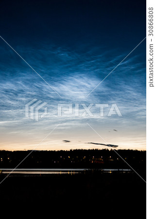 Noctilucent clouds at night sky 30866808