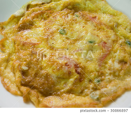 FRIED OMELETE OR OMELETTE WITH VEGETABLES 30866897