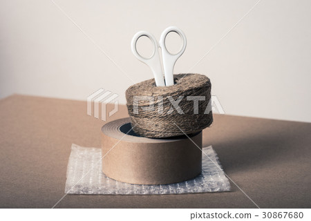 Cardboard box and gum tape Cardboard box and gum tape 30867680