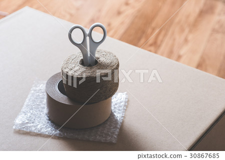 Cardboard box and gum tape Cardboard box and gum tape 30867685