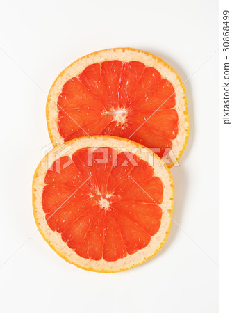 Red grapefruit slices Red grapefruit slices 30868499