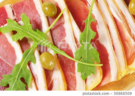 Prosciutto crudo with green olives Prosciutto crudo with green olives 30868509