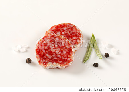 slices of French dry cured salami with spices slices of French dry cured salami with spices 30868558