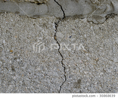 A crack in the concrete wall. A crack in the concrete wall. 30868639