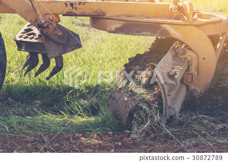 Grader leveling landfill on construction site Grader leveling landfill on construction site 30872789