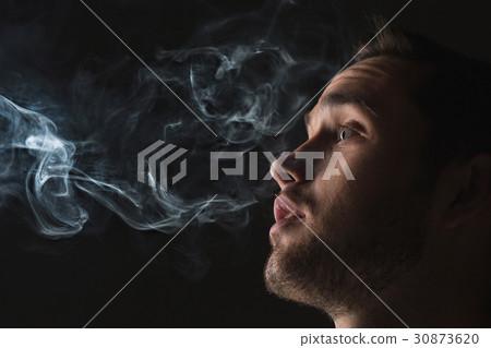 The face of vaping young man 30873620