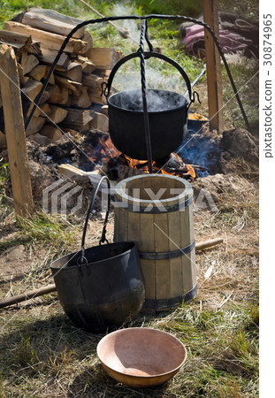 Cooking in the camp on open air Cooking in the camp on open air 30874965