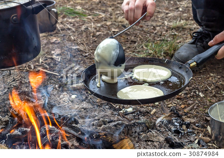 Cooking in the camp on open air Cooking in the camp on open air 30874984