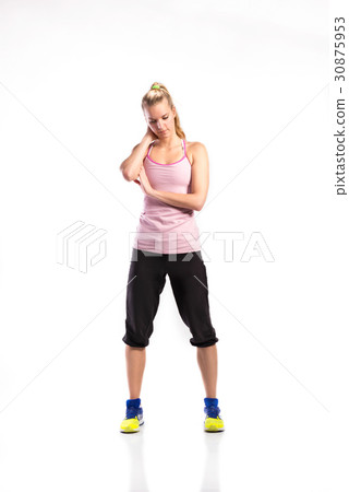 Attractive young fitness woman in sports clothes Attractive young fitness woman in sports clothes 30875953