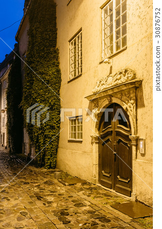 Riga, Latvia. Old Wooden Brown Door Of Portal 30876752