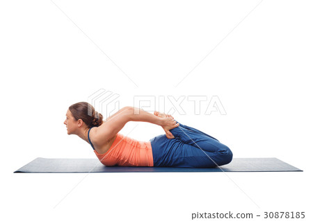 Woman doing Hatha Yoga asana Bhekasana 30878185