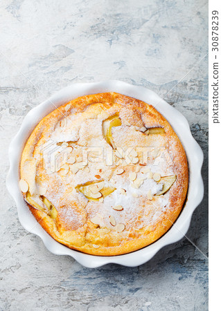 Apple dutch pancake, cake in baking dish. Top view Apple dutch pancake, cake in baking dish. Top view 30878239