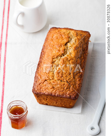 Cake, tea loaf with jam and cream White background 30878326