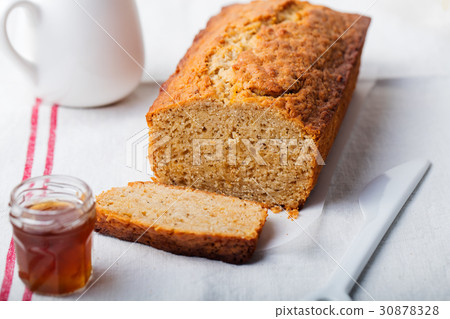 Cake, tea loaf with jam and cream White background Cake, tea loaf with jam and cream White background 30878328
