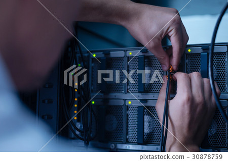 Professional experienced programmer holding LAN 30878759