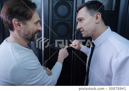 Handsome nice men pointing at the button 30878941