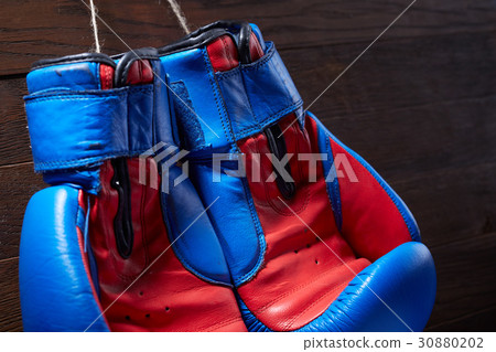 Close-up of the pair of blue and red boxing gloves 30880202