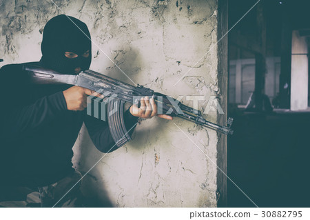 terrorist in black uniform terrorist in black uniform 30882795