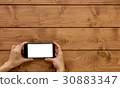 Close up Mobile phone on women hand  30883347