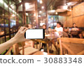 Close up Mobile phone on women hand  30883348
