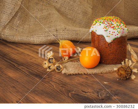 Easter cake and easter colored egg with dry flower Easter cake and easter colored egg with dry flower 30886232