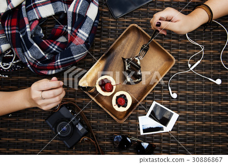 People having sweet dessert cake together People having sweet dessert cake together 30886867