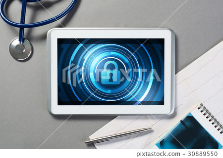 Web security and technology concept with tablet pc on table 30889550