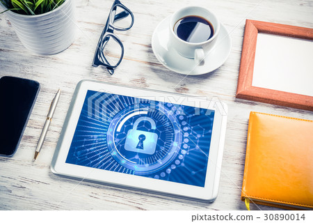 Web security and technology concept with tablet pc on wooden table Web security and technology concept with tablet pc on wooden table 30890014