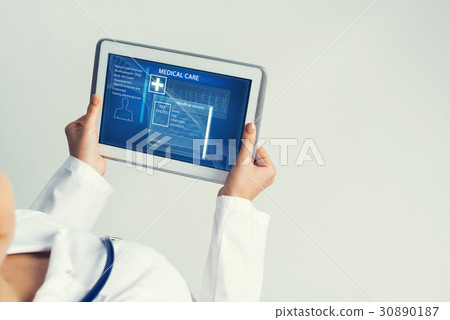 Close of female doctor hands working with tablet pc computer 30890187