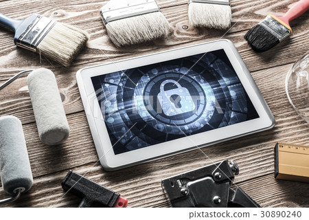 Web security and technology concept with tablet pc on wooden table Web security and technology concept with tablet pc on wooden table 30890240