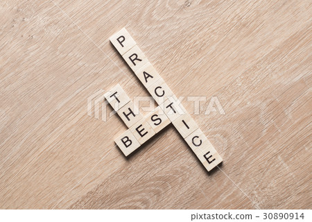 Conceptual business keywords on table with elements of game making crossword Conceptual business keywords on table with elements of game making crossword 30890914