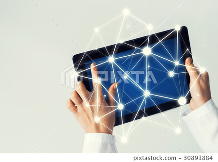 Close of female doctor hands working with tablet pc computer 30891884