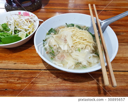 noodles and dumpling in the soup noodles and dumpling in the soup 30895657