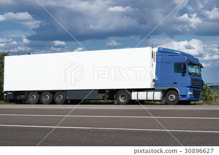 Truck on road with white blank container, blue sky Truck on road with white blank container, blue sky 30896627