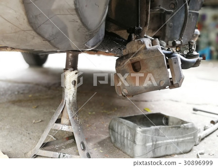 The old car maintenance process 30896999