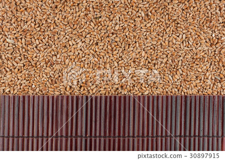 Beautiful bamboo mat on wheat grains 30897915