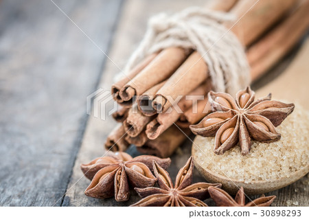 Cinnamon sticks and star anise on brown sugar 30898293