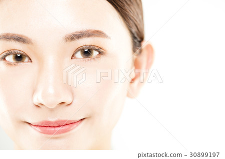 closeup young woman face isolated on white closeup young woman face isolated on white 30899197