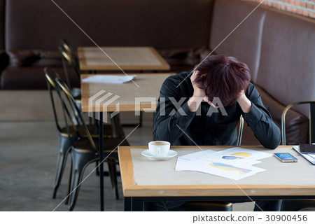 business man sitting in depression 30900456